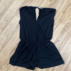 BCBG romper, like new condition. Size small